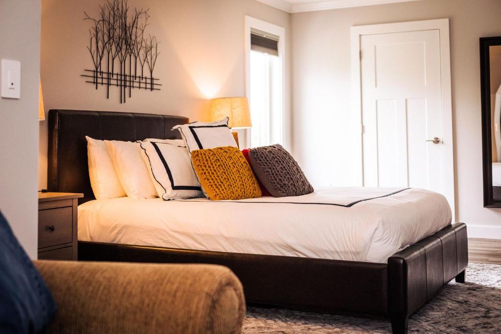 a white plate topped with a salad covered in shrimp